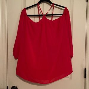 Red flowy top.